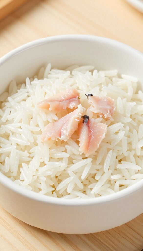 Homemade poached trout and rice dog food in a white bowl, simple and gentle for sensitive stomachs.
