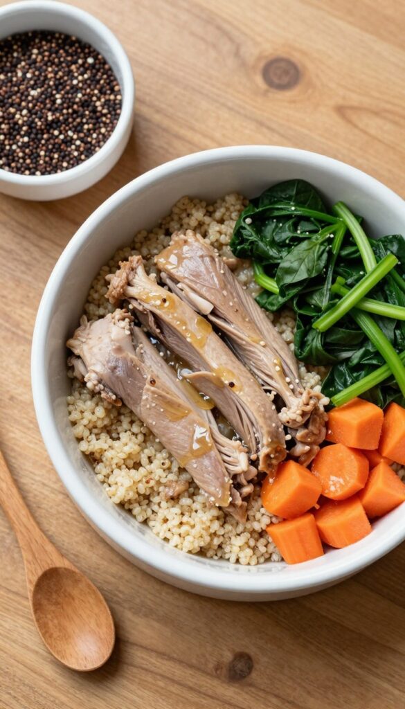 A dog bowl filled with a homemade duck and quinoa dog food mix, featuring ground duck, quinoa, spinach, and carrots, on a wooden table in natural light.