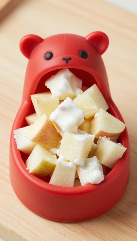 A red dog Kong toy stuffed with lamb and apple chunks, resting on a wooden board, photorealistic pet food photography.