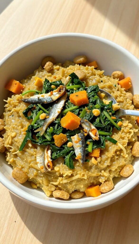 Dog bowl with kibble topped with sardine and spinach mash, natural lighting, overhead view
